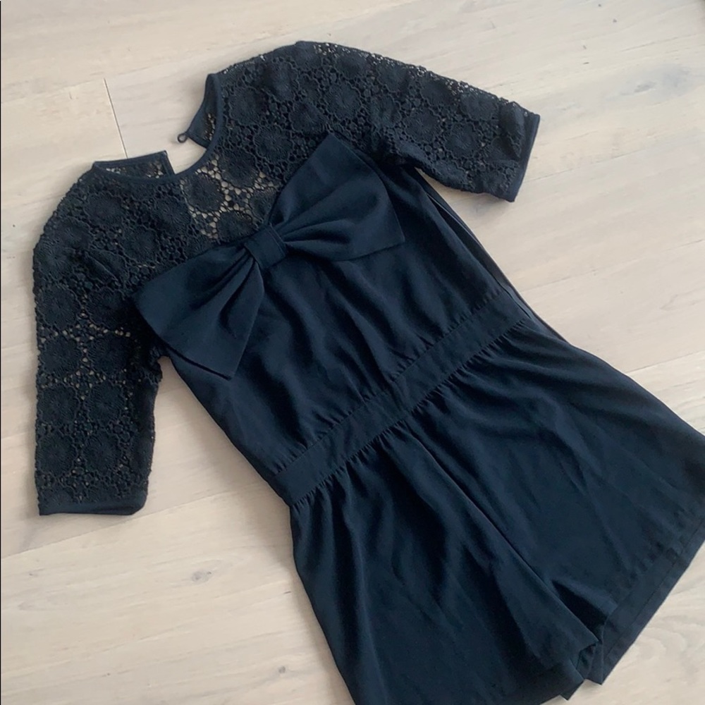 ASOS black romper with bow and crochet detail